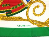 scarf with a picture of a coat of arms and a crown on it