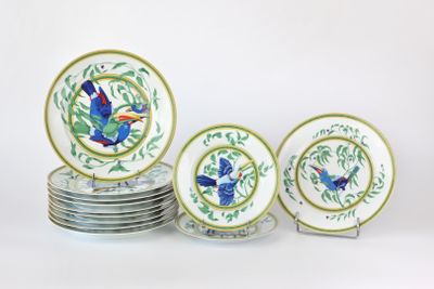 a lot of plates with birds painted on them
