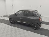 an image of a small car parked in a garage