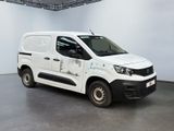 a white van that is parked in a room