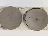 marble coasters on a white background with two circles on them
