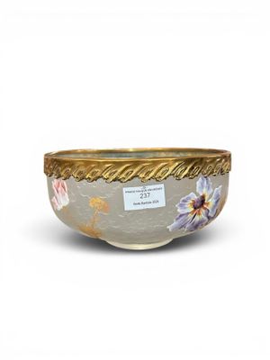 an image of a bowl with flowers painted on it on a white surface