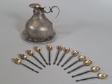 a lot of spoons and spoon spoons on the table