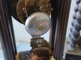 a clock that is sitting on a table in a room