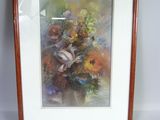 painting of a vase of flowers in a wooden frame on a white wall