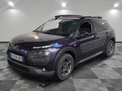 a picture of a purple car parked in a garage