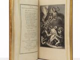 an open book with a picture of a man on a horse and a woman on a horse