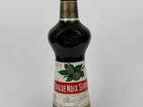 an image of a bottle of liquor sitting on top of a table