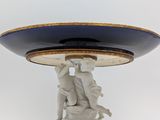 a statue that is sitting on top of a table