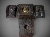 an image of a wooden cross with a face in the center