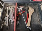 a tool box with tools in it and a wrench in it