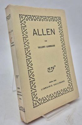 an old book with a black and white design on it