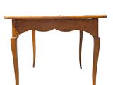 an image of a wooden table with a drawer underneath it