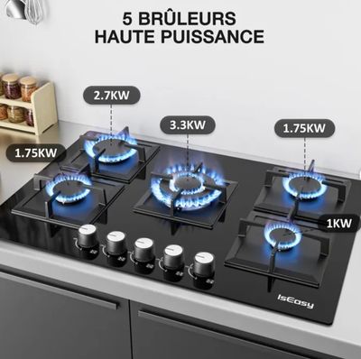 cinq brûleurs sur la plaque de cuisson de la cuisinière