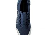 a close up of a pair of blue sneakers on a white background