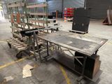a cart with a table on it in a warehouse
