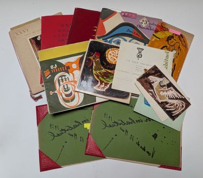 a pile of old postcards with writing on them