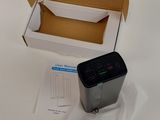 a box that has a printer in it on a table