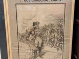 two framed posters of french soldiers in front of a wooden wall