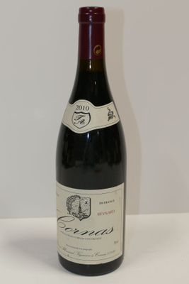 a bottle of wine that is sitting on a table