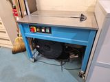 a machine that is sitting on the floor in a room