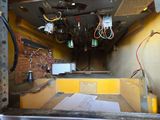 a view of the inside of a bus with a lot of wires on it