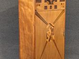 an image of a wooden cabinet with a clock on top of it