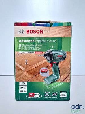 the box of a bosch impactdriver is sitting on a table