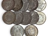 an image of a bunch of coins sitting on top of a white surface