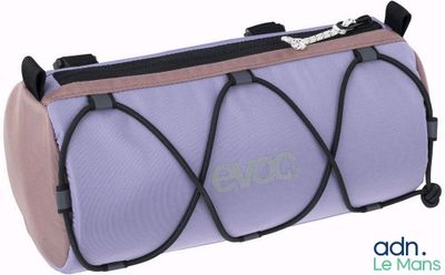 purple and black travel bag with zippers on top of it