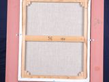 an image of an easel with a painting on it and a picture frame on it