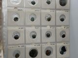 a picture of a display of coins on a wall