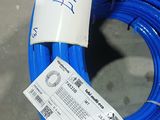 a roll of blue wire with a price tag on it