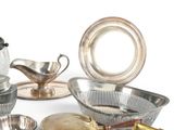 a lot of silver items that are on the table