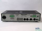 a close up of a radio receiver on a white surface