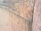 a close up of a piece of wood on a table