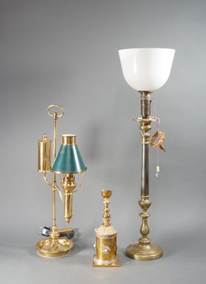 three different types of lamps and a lamp shade on a gray background