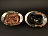 pair of silver and gold plated cufflinks with leather linings