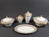 an image of a group of porcelain dishes and cups on a table