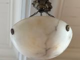a light that is hanging from a ceiling in a room
