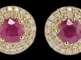 une paire de boucles d'oreilles en rubis et diamants