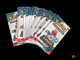 five packs of pokemon trading cards on a black background