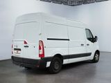 a picture of a white van parked in a garage