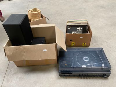 many boxes of electronic equipment sitting on the ground