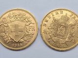 two gold sovereigns, one with a crown and the other with a shield