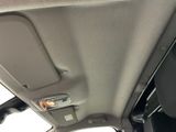 a view of a car ' s interior from the passenger seat