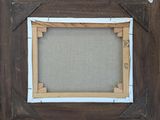 an image of a picture frame made out of a piece of wood