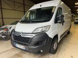 a white van that is parked in a garage