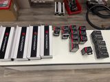 a table with a lot of electronics on top of it