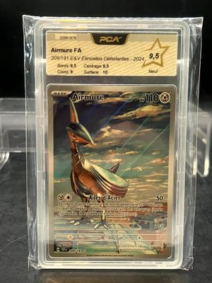 a close up of a pokemon card in a clear box